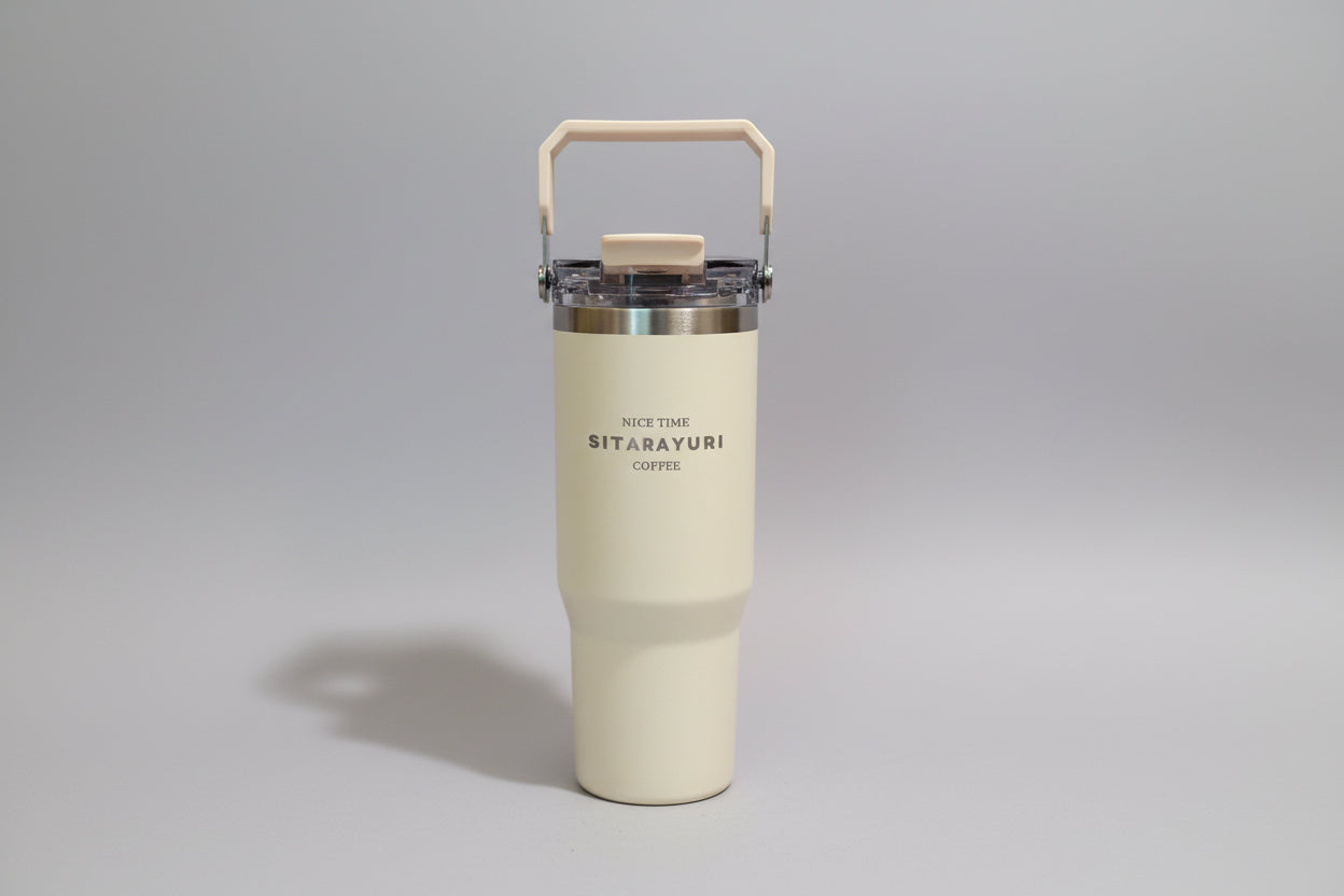 NIYO TOYS stainless steel tumbler with straw in cream color, ideal for all ages and outdoor use