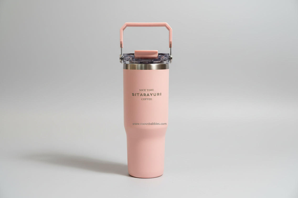 Pink stainless steel tumbler with straw, perfect for adults enjoying hot or cold beverages on the go