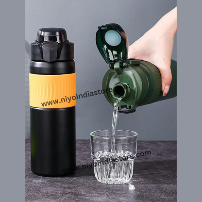 NIYO TOYS stainless steel vacuum bottle in black and green, perfect for outdoor activities and hydration