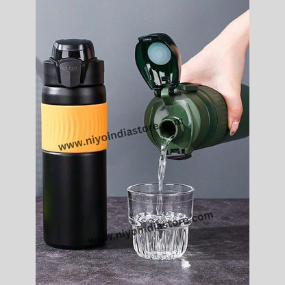 NIYO TOYS stainless steel vacuum bottle in black and yellow, ideal for outdoor use and hydration.