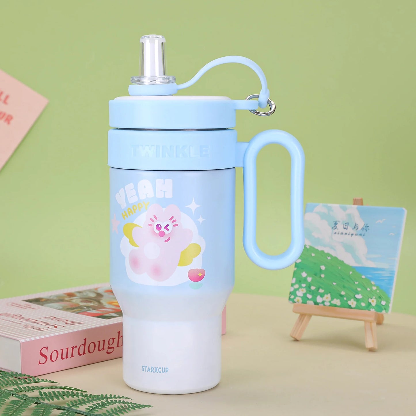 Blue NIYO TOYS insulated tumbler with a cute character design, ideal for kids aged 3+, perfect for outdoor activities