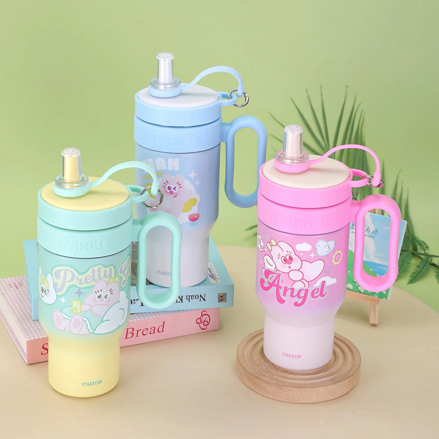 Colorful NIYO TOYS insulated tumbler in blue, pink, and yellow for kids aged 3+ with fun designs