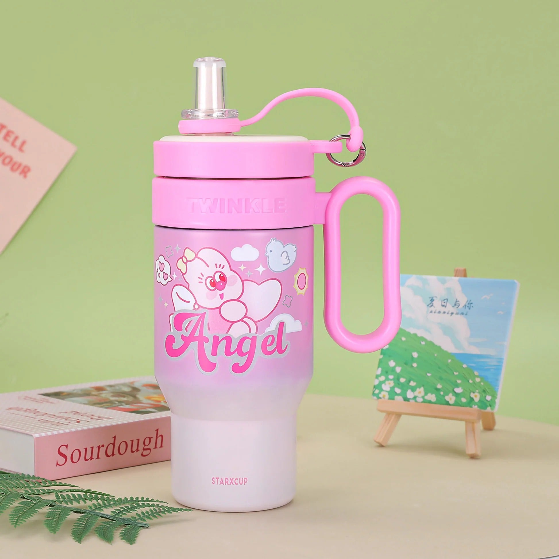 Pink insulated tumbler for kids featuring cute angel design, ideal for ages 3 and up