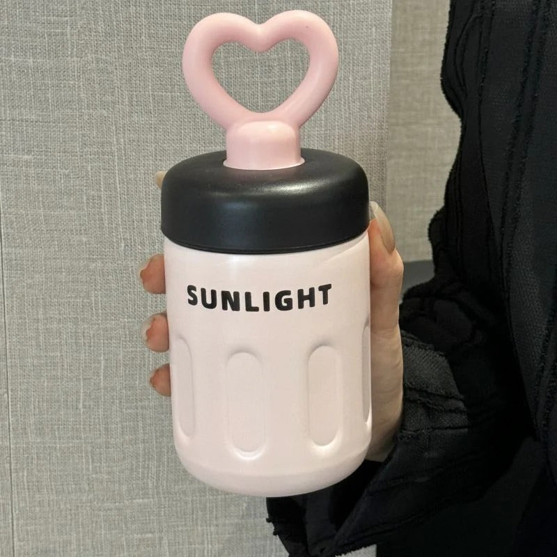 NIYO TOYS pink heart handle tumbler for kids, perfect for drinks and outdoor activities
