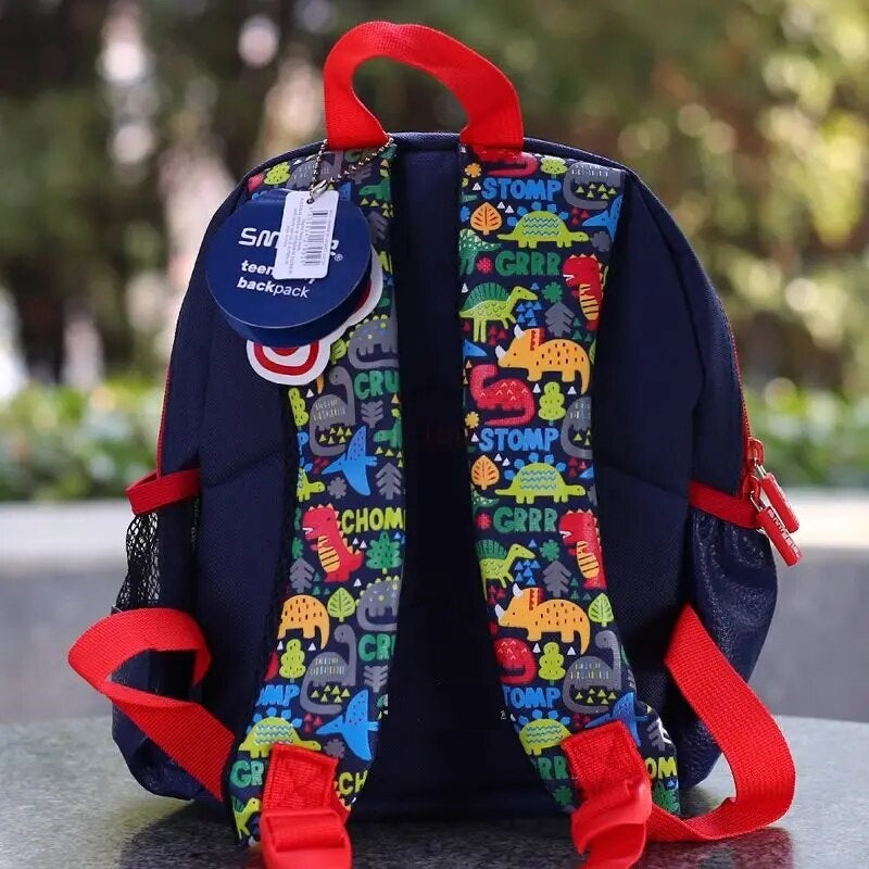 Navy toddler backpack with colorful dinosaur design, suitable for ages 3+, perfect for preschool or daycare
