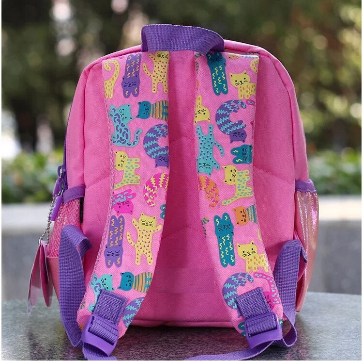 Colorful pink toddler backpack with cartoon cats, perfect for age 3+ children for preschool use