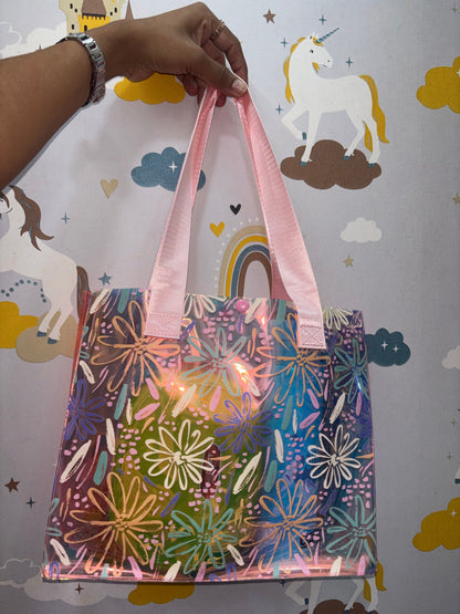 Colorful floral NIYO TOYS tote bag with pink handles, perfect for ages 3+ for events and everyday use.