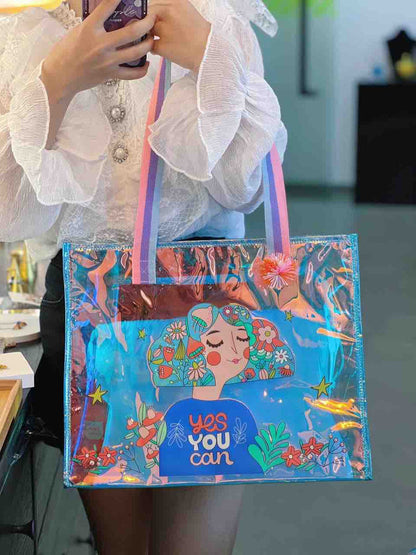 Clear tote bag with colorful graphic design, suitable for all ages, perfect for outings and everyday use
