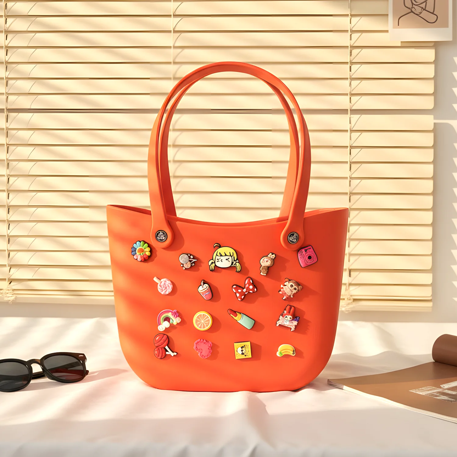 Bright orange tote for beach with fun accessories, ideal for kids and summer outings