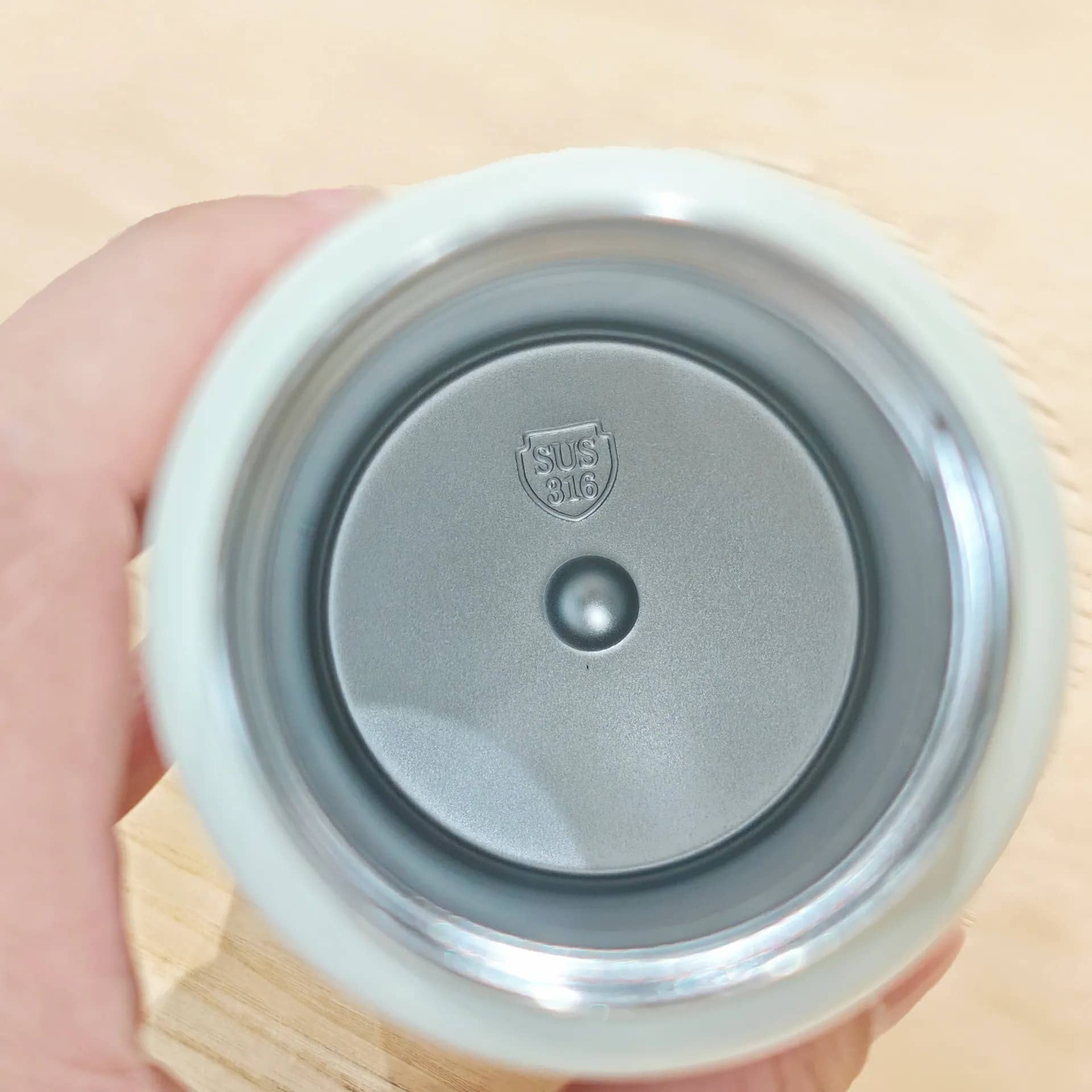 Inside view of NIYO TOYS stainless steel drinks bottle, perfect for keeping drinks cold for kids.