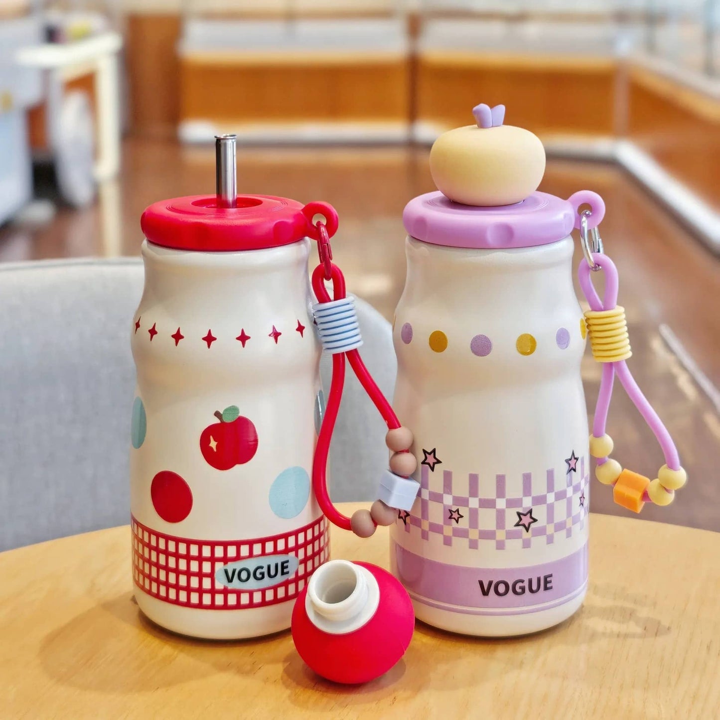 NIYO TOYS stainless steel drinks bottle in red and purple, designed for kids age 3+, ideal for outdoor activities