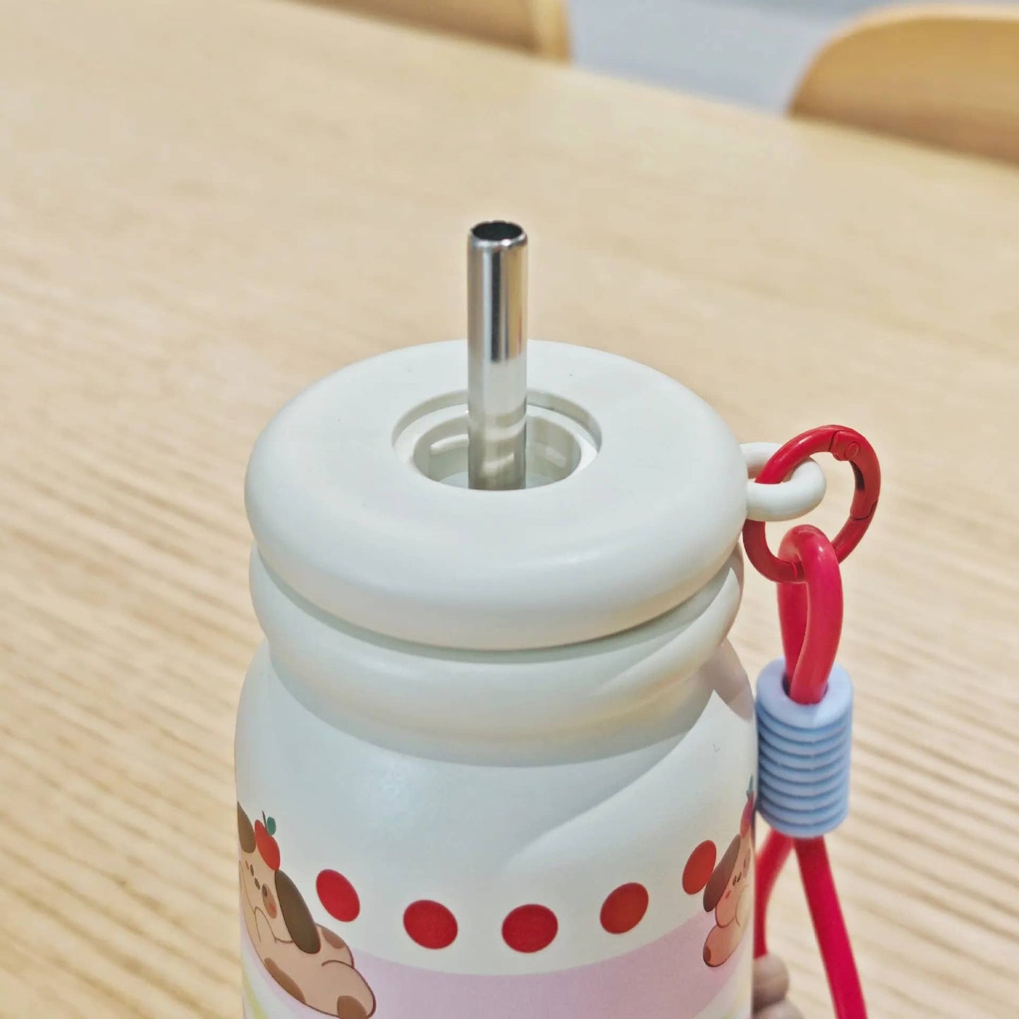 White stainless steel drinks bottle with a straw, designed for kids age 3+, ideal for on-the-go hydration